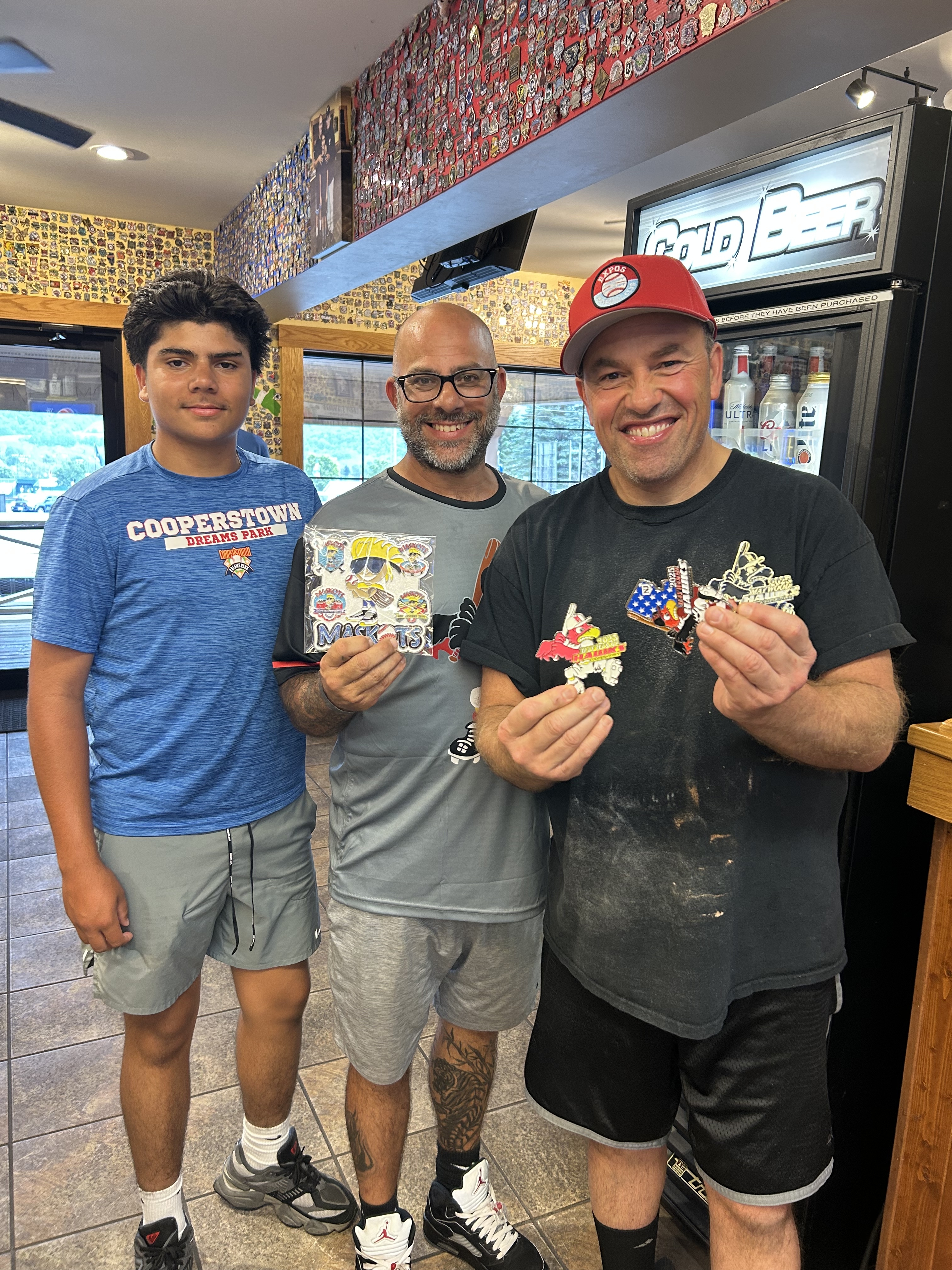 Pin traders showing off their collections