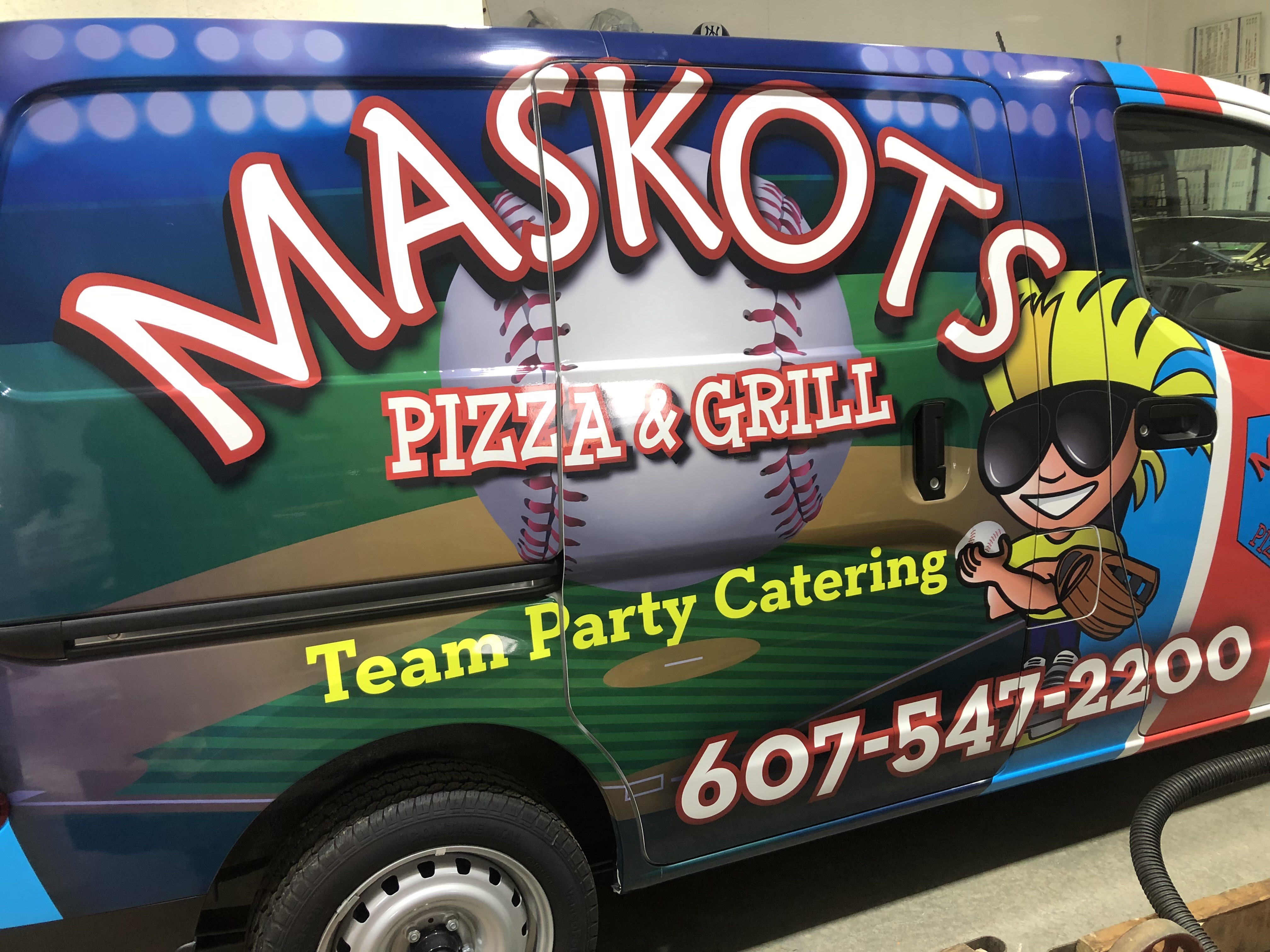 Maskots delivery van with team party catering